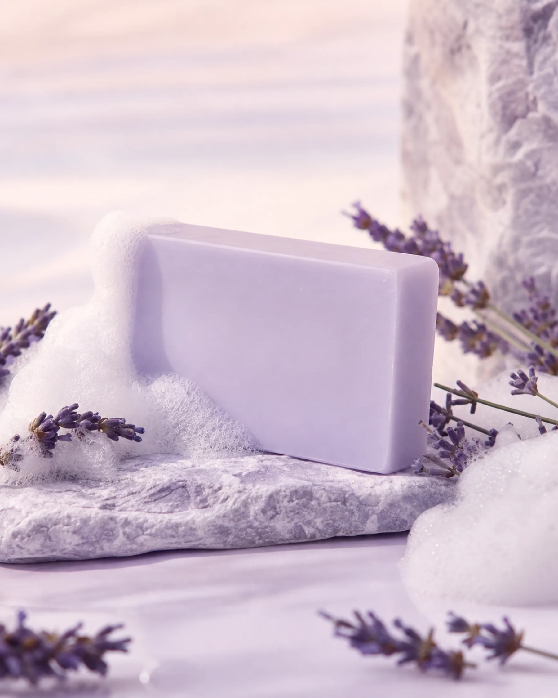 Lavender Cloud Body Bar styled with its key ingredients in soft daylight
